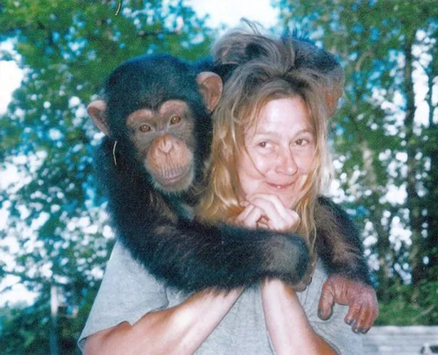Charla Nash poses with Travis before the attack which left her badly maimed for life